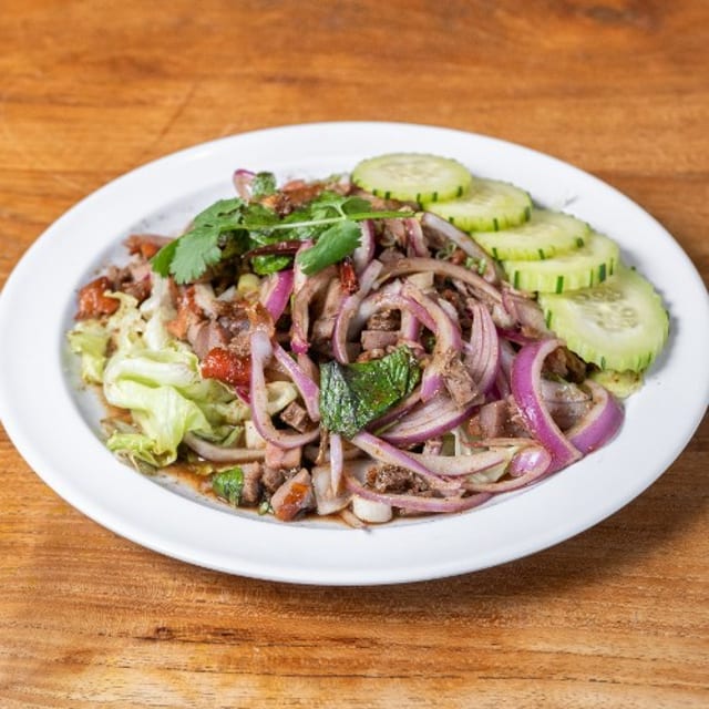 Larb Bpet.